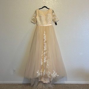 Beautiful cream wedding or formal dress.